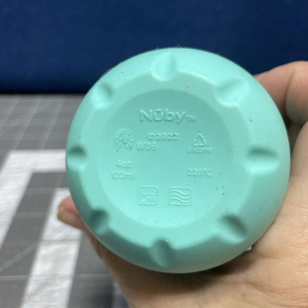 Nuby Baby's First Training Cup, 100% Silicone - Weighted‎ Base - BPA Free